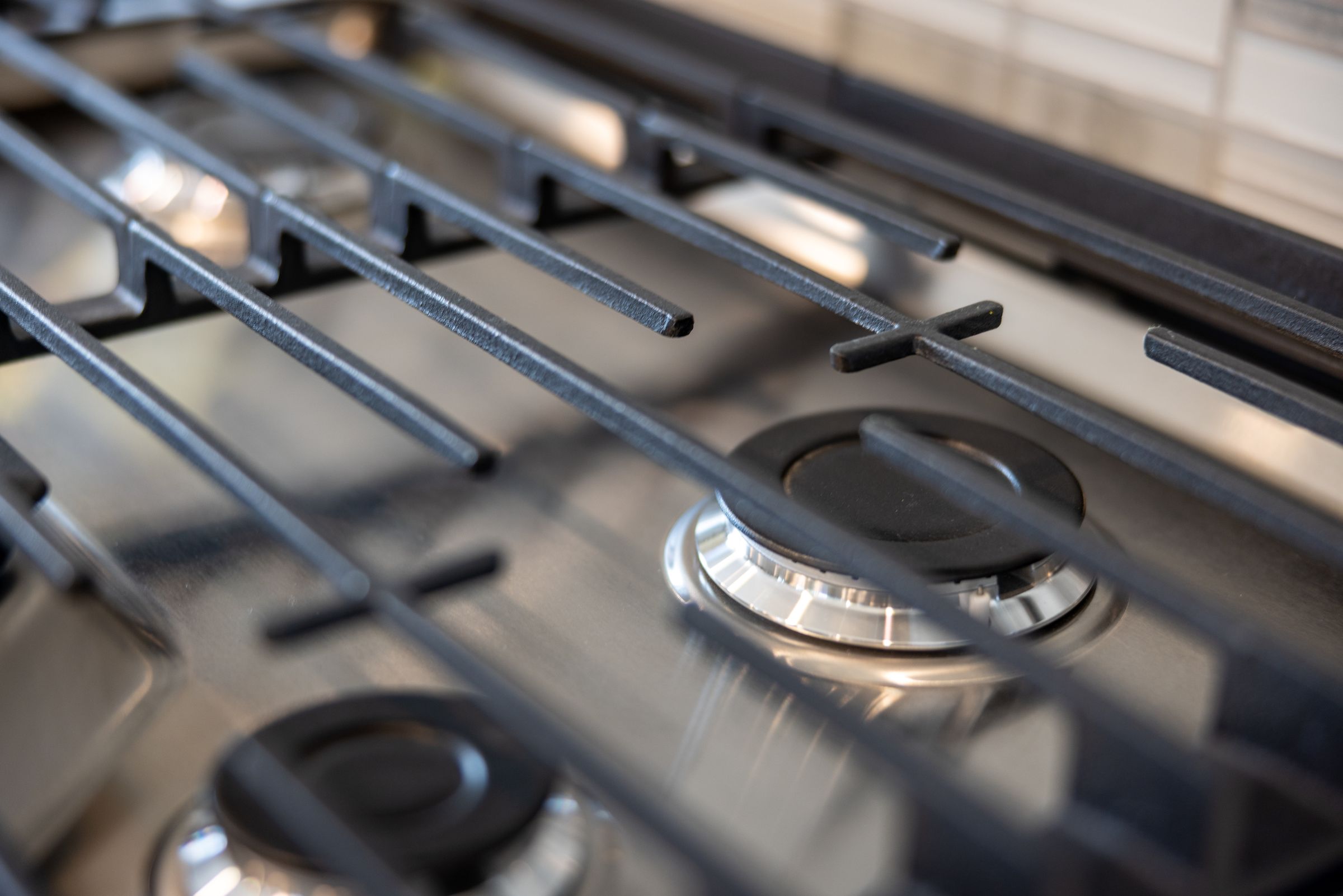Cast-iron grates over gas range burners